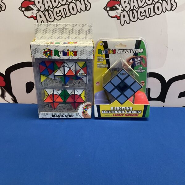 Sealed Rubik's Cubes, classic puzzle for brain training and collecting.