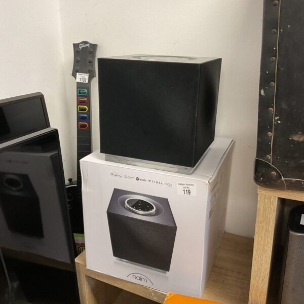 Naim Mu-so Qb 2nd Generation smart speaker in a modern setting.