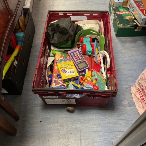 Mixed toy lot with educational games and play cones.