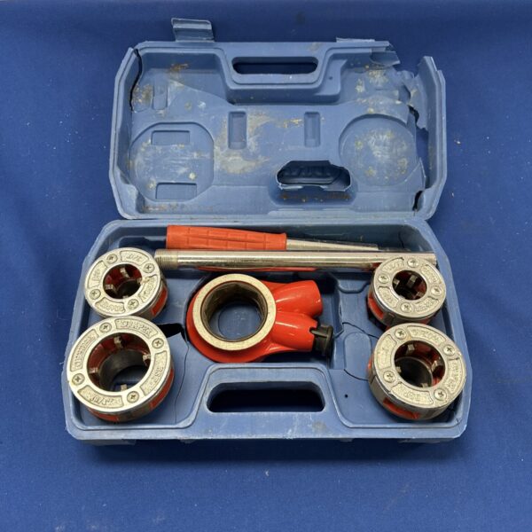 Vintage Draper pipe threading tool kit with dies and handle.