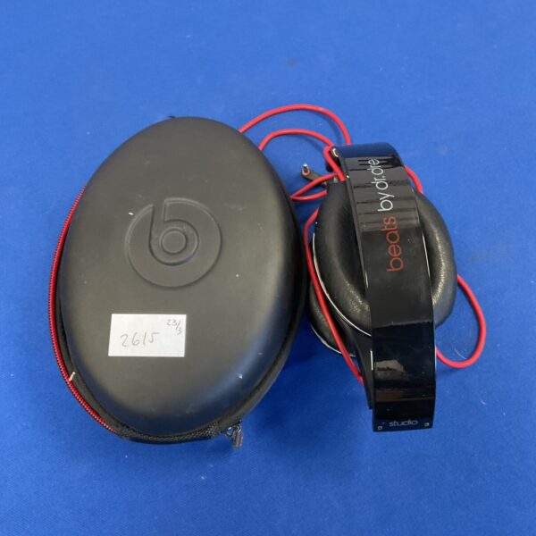 Wired Beats by Dre headphones, over-ear audio equipment.