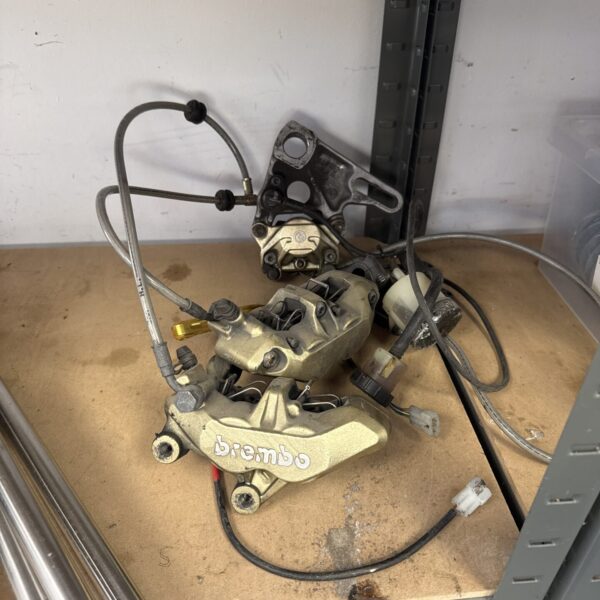 Used Brembo brake caliper from Aprilia RSV Mille motorcycle.