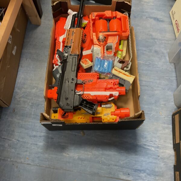 Mixed lot of Nerf guns and toy components for collectors.