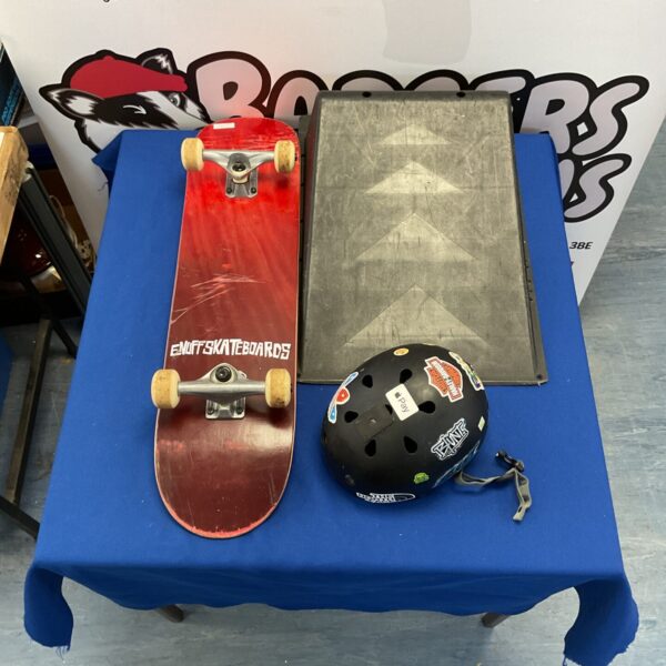 Enuff Skateboards set with ramp and helmet for skateboarding.