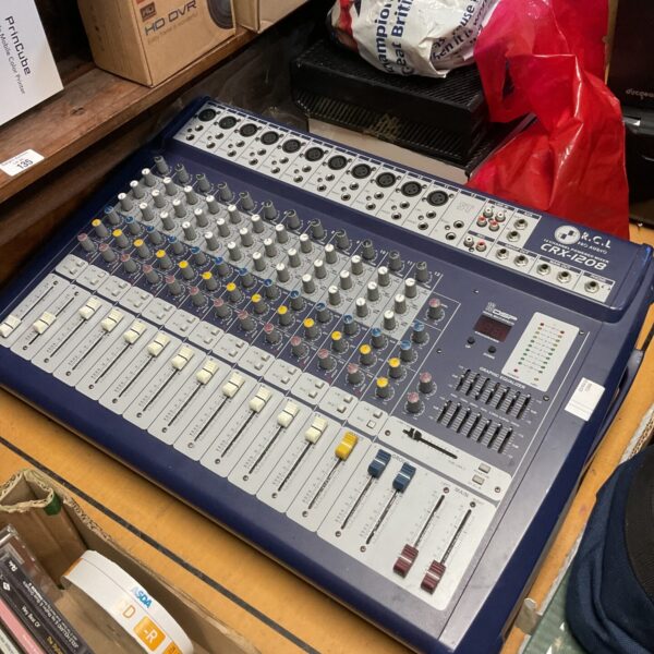 Vintage RCL CRX-1208 studio mixer with multiple controls.