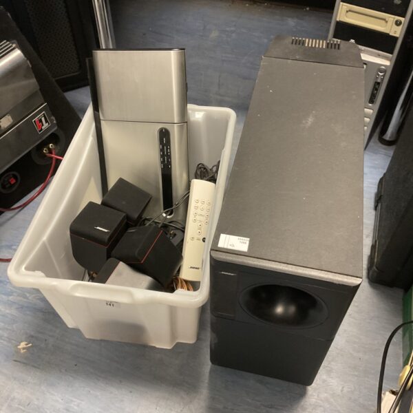 Used Bose Acoustimas system with subwoofer and satellite speakers.