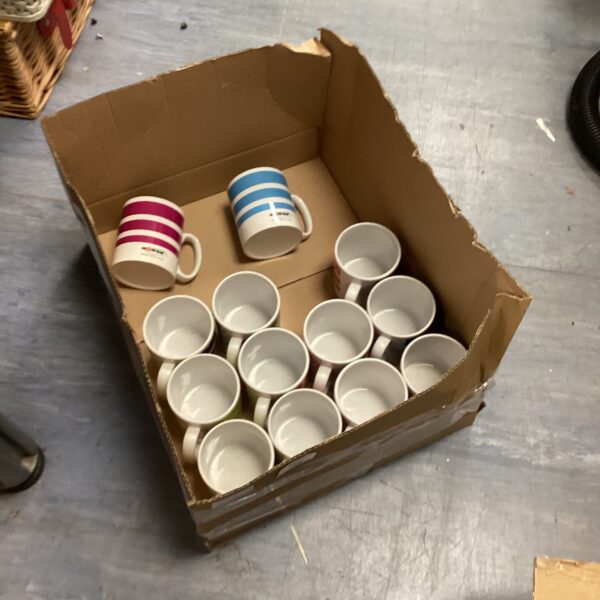 Lot of thirteen Norsk mugs with striped patterns.