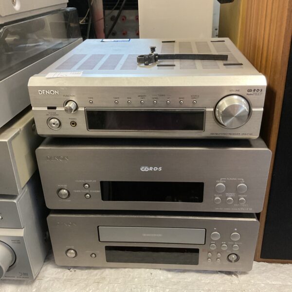 Front view of a vintage Denon DRA-F101 stereo receiver.