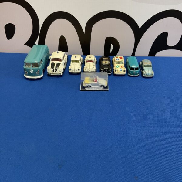 Vintage VW diecast model collection including Corgi and Lesney cars.