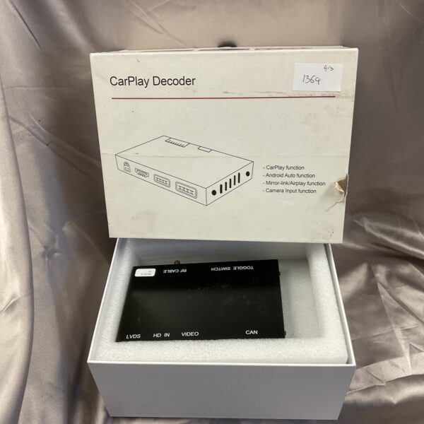 Compact carplay decoder interface module for vehicle entertainment systems.