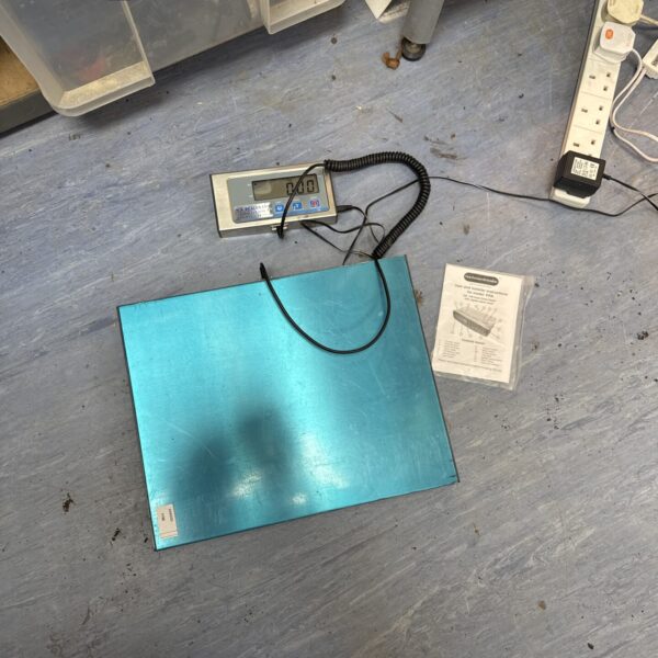 Vintage Northmace & Hendon industrial scales for workshop use.