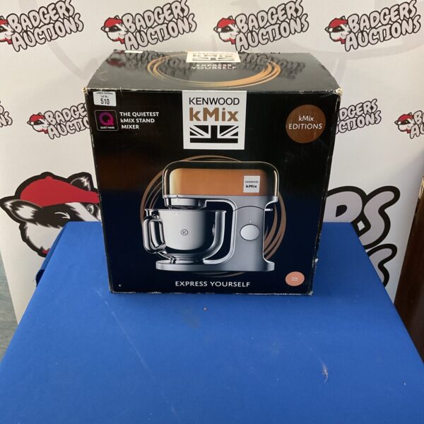 Red Kenwood kMix stand mixer for baking and cooking.