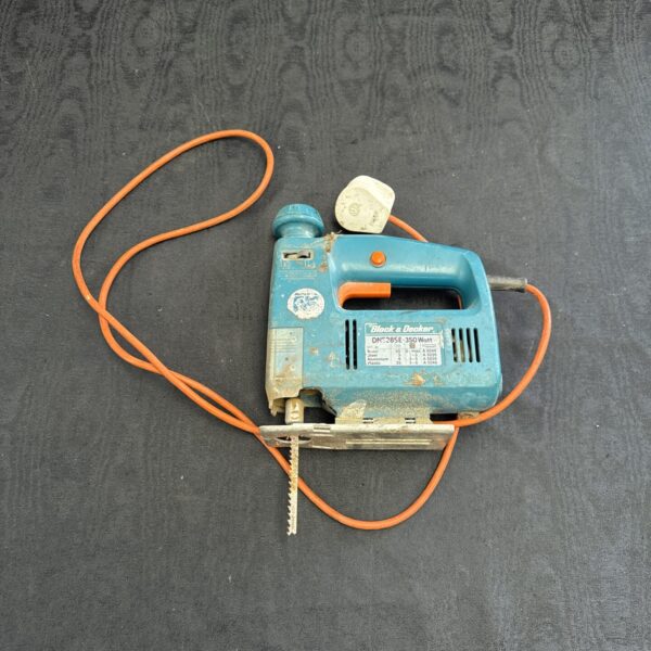 Vintage Black & Decker jigsaw power tool for woodworking and DIY projects.