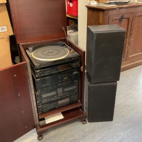 Vintage Technics SC-CA300 HiFi system with turntable in dark wood cabinet.