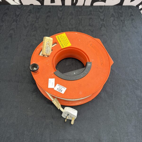 Orange cord reel extension for cable management.