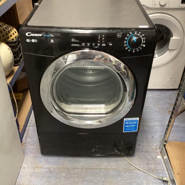 White Candy Smartpro tumble dryer, front view, laundry appliance.