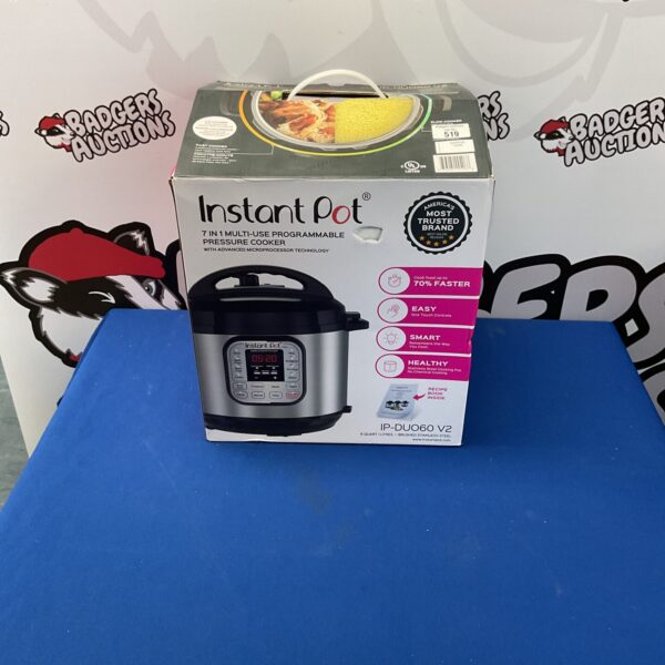 Instant Pot 7-in-1 pressure cooker appliance in box.