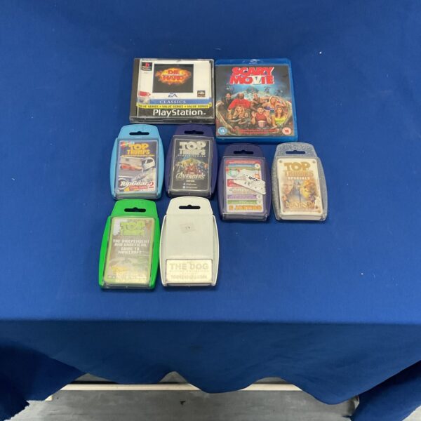 Top Trumps, Scary Movie DVD, and PlayStation 1 game bundle for collectors.