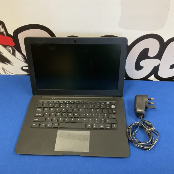 Unbranded mini laptop with charger included, compact portable computer.