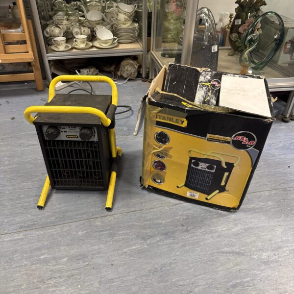 Front view of a Stanley workshop heater for spares or repair.