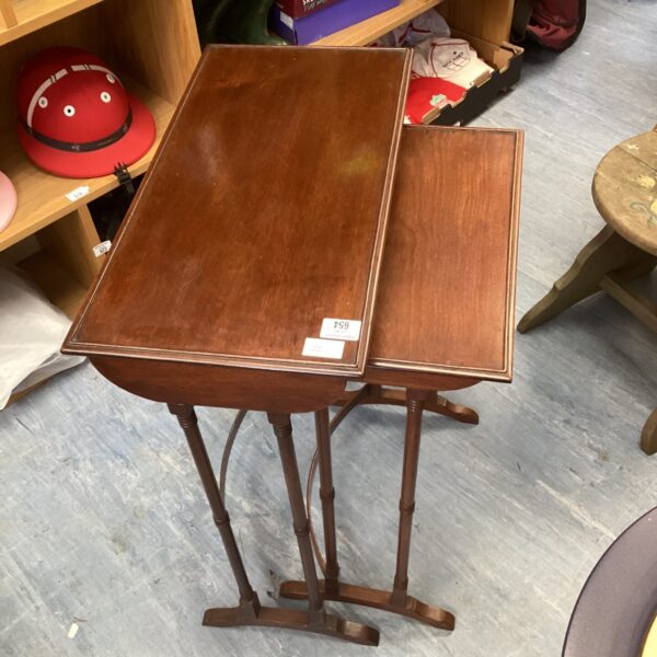 Antique Edwardian mahogany nest of tables with curved legs.