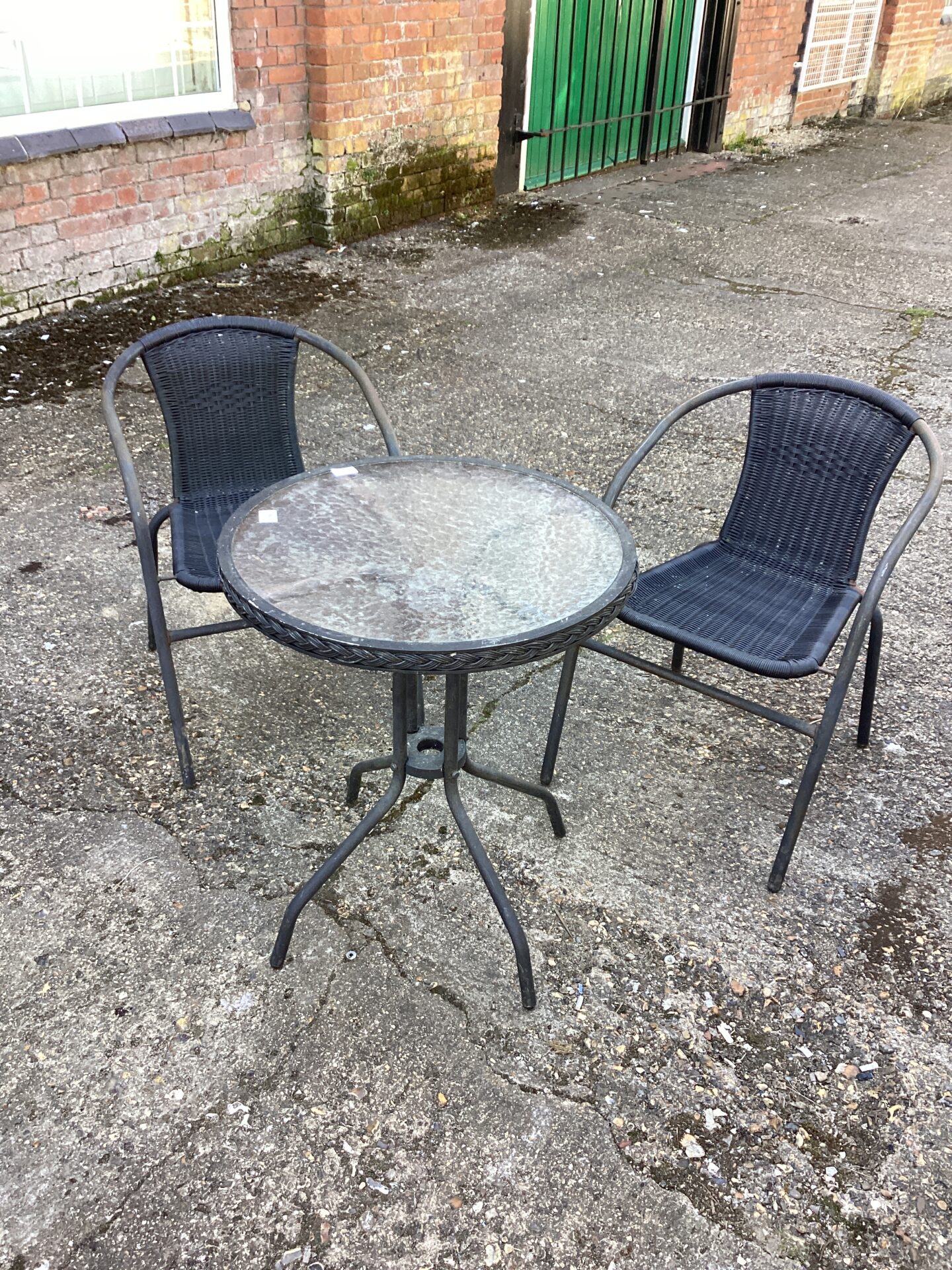 1285 Glass topped garden table with Two Chairs