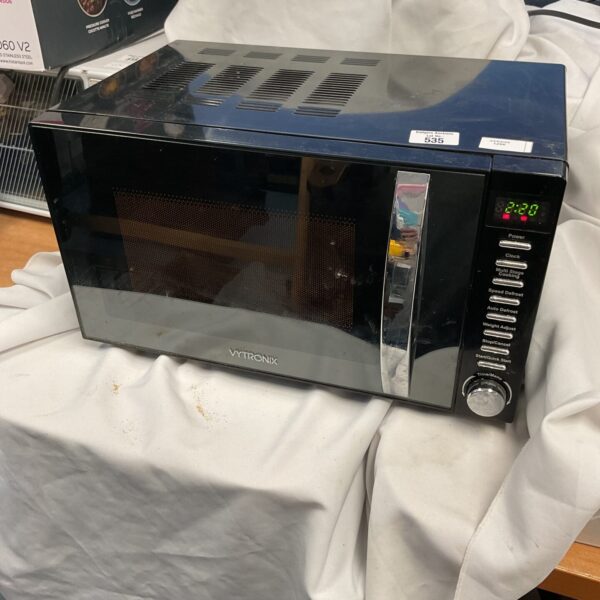 Front view of a Vytronix microwave oven, a compact kitchen appliance.