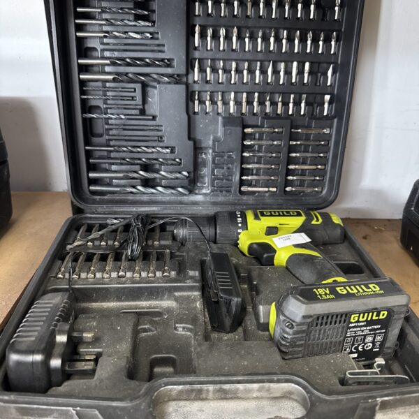 Open Guild electric drill set with drill bits and accessories.