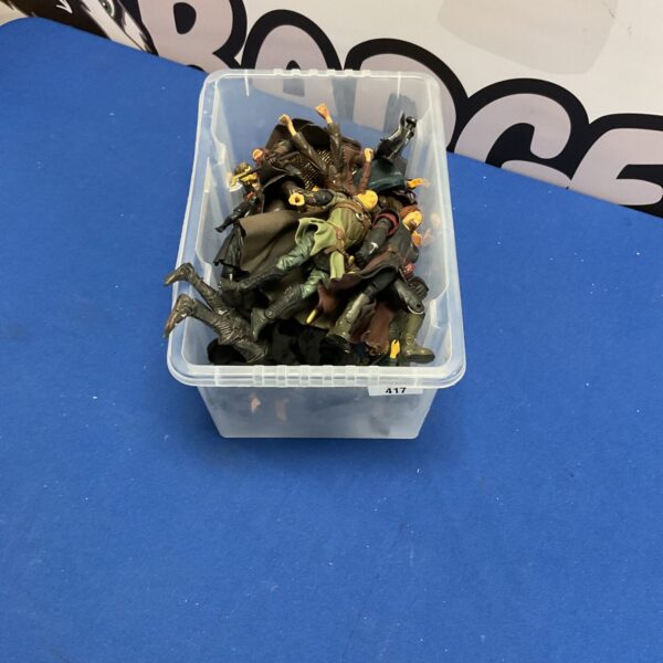 A lot of *Lord of the Rings* figures in a plastic container.