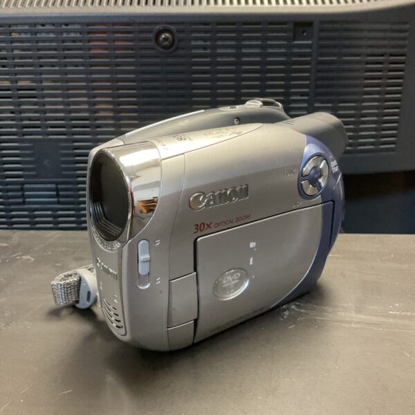 Vintage Canon DC201 digital camcorder for video recording.