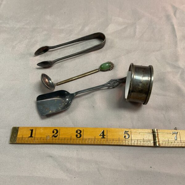 Vintage silver plate cutlery set with sugar tongs and napkin ring.