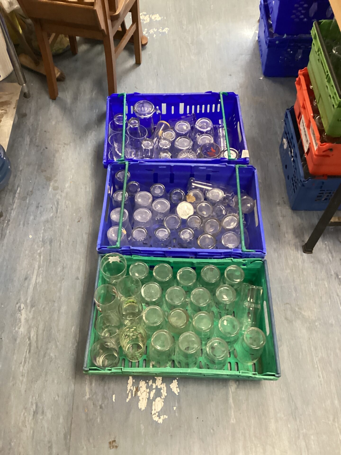 633 Three crates of mixed branded pub glasses inc 1664 & stowford press