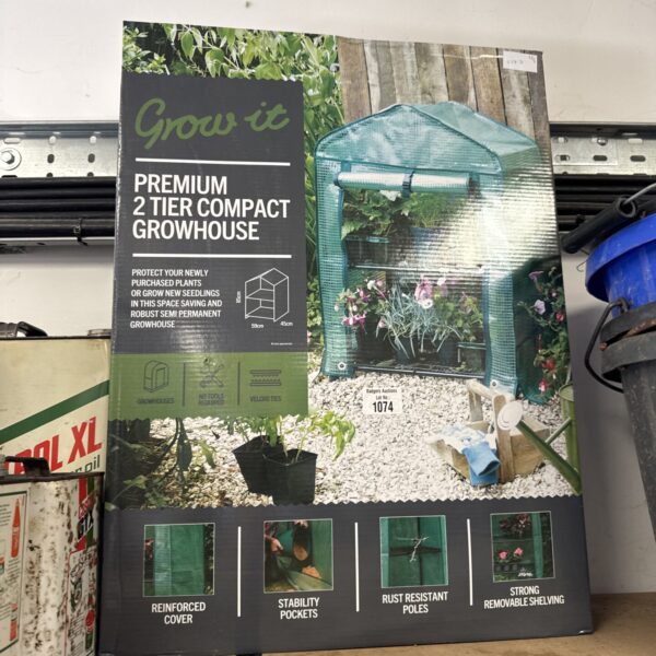 Compact 2-tier grow house for starting seeds and plants.