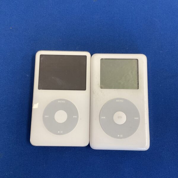 Two Apple iPod Classic MP3 players, one with a damaged screen.