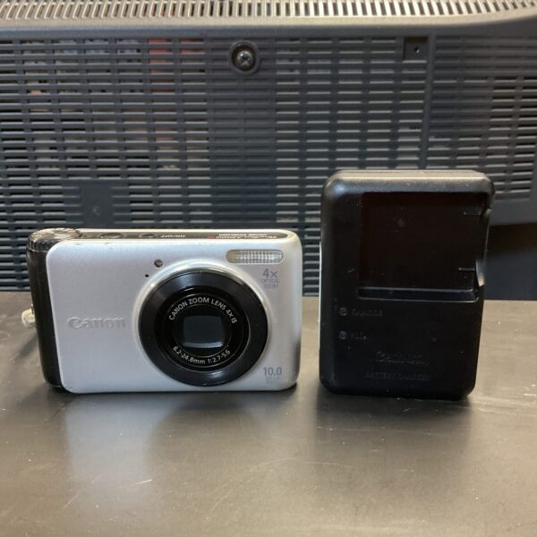 Silver Canon PowerShot A3000 digital camera with flash.