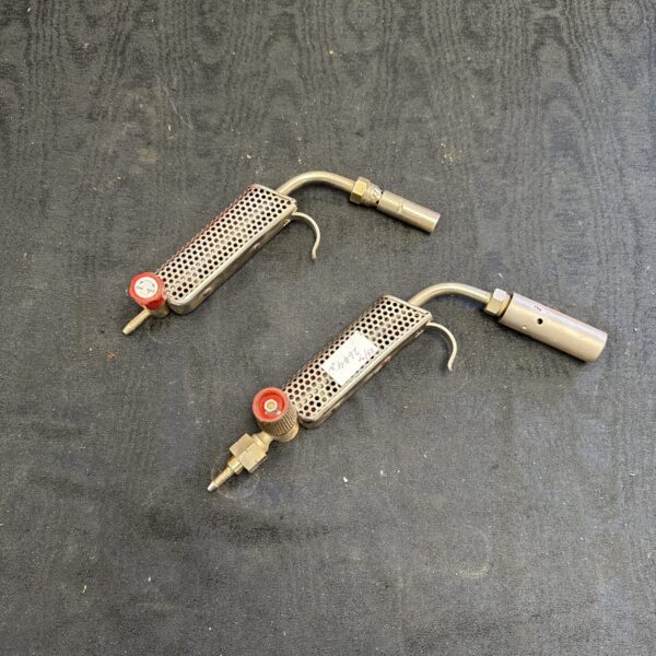 Pair of vintage miniature gas blow torches for detailed work.