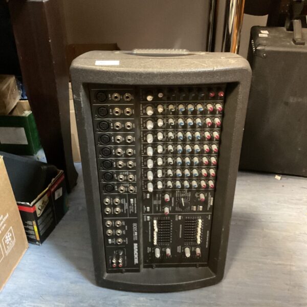 Vintage Mackie 808 amplifier mixer with multiple inputs and outputs.