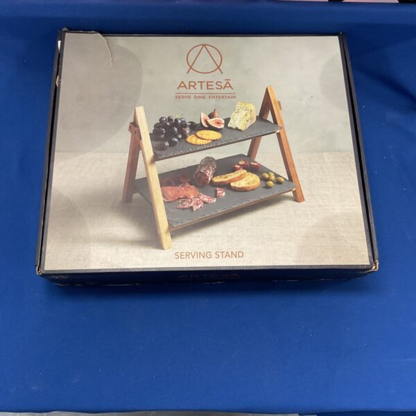 Modern Artesā serving stand for elegant food display.
