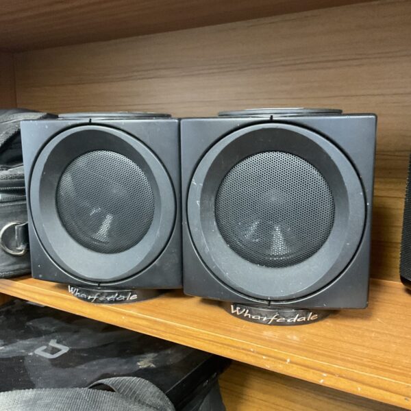 Pair of vintage Wharfdale Modus bookshelf speakers in black.