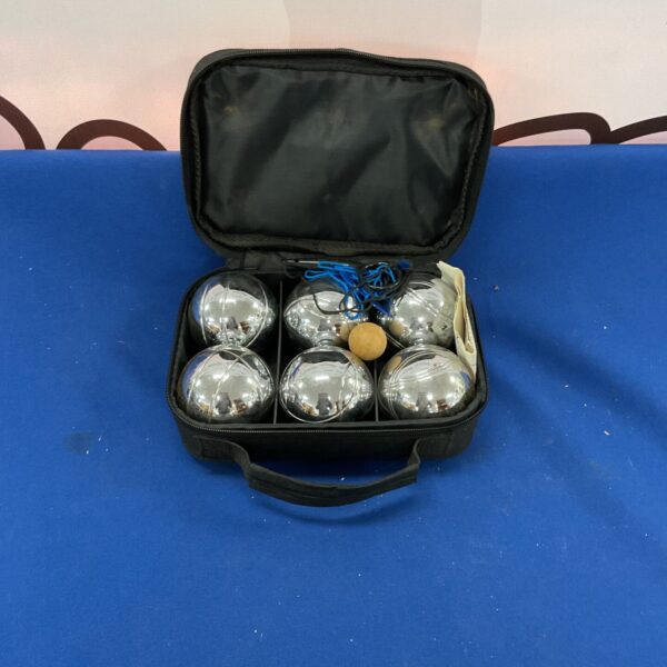 Vintage boules set in a black carrying case, ready for outdoor play.