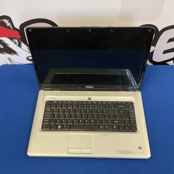 Vintage Dell Inspiron laptop running Windows Vista operating system.