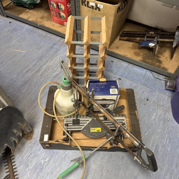 Mitre saw and tool lot including floodlight and sprayer.
