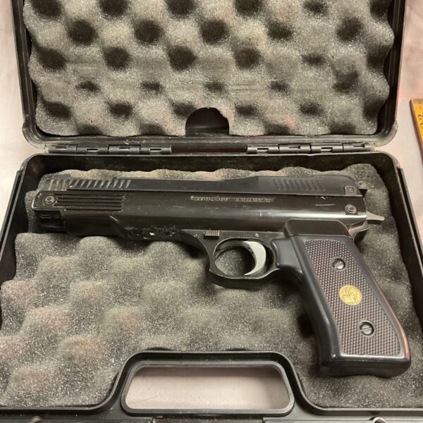 Vintage Webley Nemesis .22 pneumatic pistol in its case.