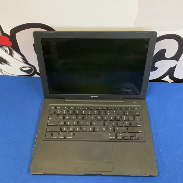 Black Apple MacBook A1181 vintage laptop, closed view.