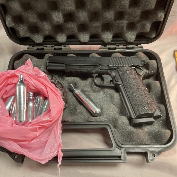 CO2 BB pistol in case with gas and BBs for target practice.