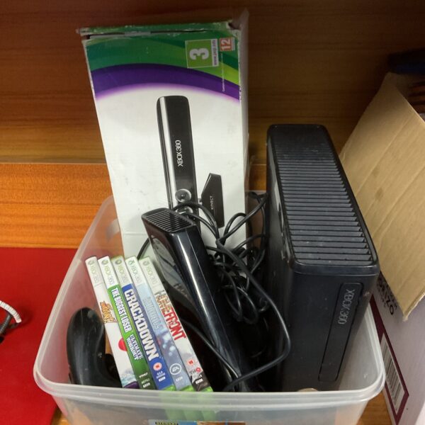 Microsoft Xbox 360 console with Kinect and games.