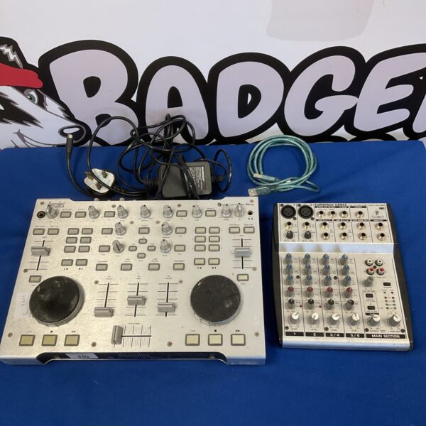 Hercules RMX DJ console and Behringer UBB02 mixer setup for music production.