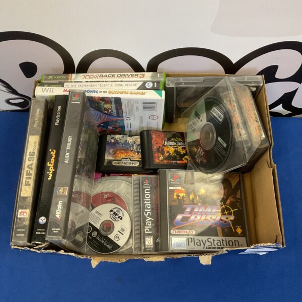 Mixed lot of PlayStation and Sega console games for collectors.