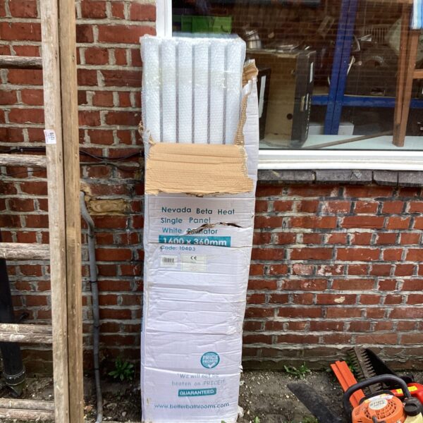 White Nevada Beta radiator in original packaging for home heating.