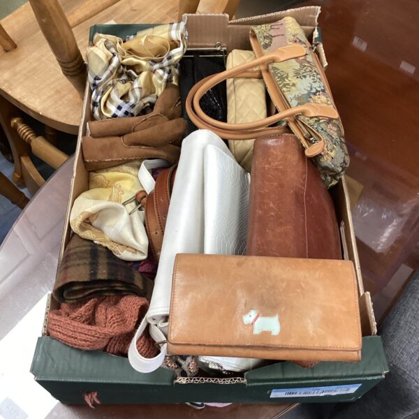 Mixed lot of ladies handbags, scarves and gloves for sale.